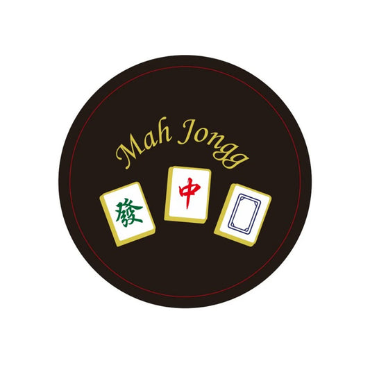 Round black mahjong coaster featuring gold "Mah Jongg" lettering and three colorful mahjong tiles representing the Green Dragon, Red Dragon, and White Dragon. A stylish drink coaster for mahjong lovers.