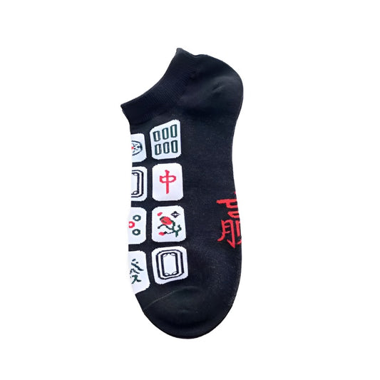 Black mahjong-themed ankle sock featuring traditional mahjong tile designs with Chinese characters and symbols in red, black, and white.
