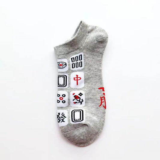 Gray mahjong-themed ankle sock featuring colorful mahjong tile designs with Chinese characters and traditional symbols in red, black, and white.