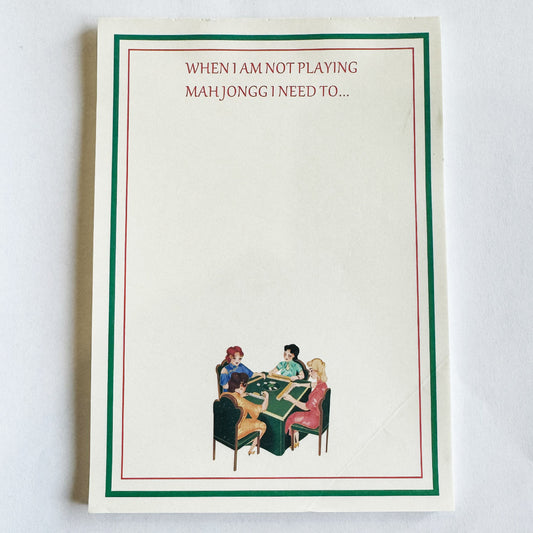 Mahjong-themed to-do list notepad featuring the phrase "When I Am Not Playing Mah Jongg I Need To..." with a red and green border and a vintage illustration of four women playing mahjong at the bottom.
