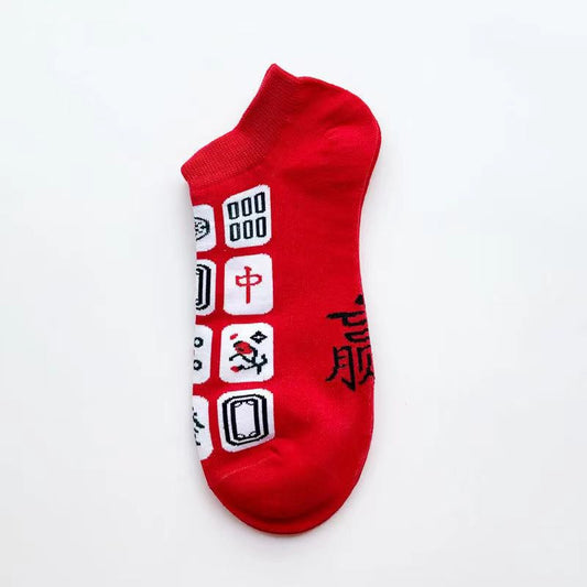 Red mahjong-themed ankle sock featuring traditional mahjong tile designs with Chinese characters and symbols in red, black, and white.